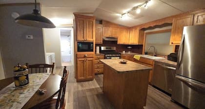 Charming 2-bedroom house in nice gated community with AC , shared swiming pool