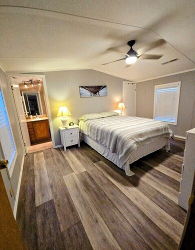 Charming 2-bedroom house in nice gated community with AC , shared swiming pool