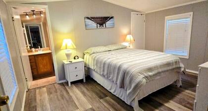 Charming 2-bedroom house in nice gated community with AC , shared swiming pool