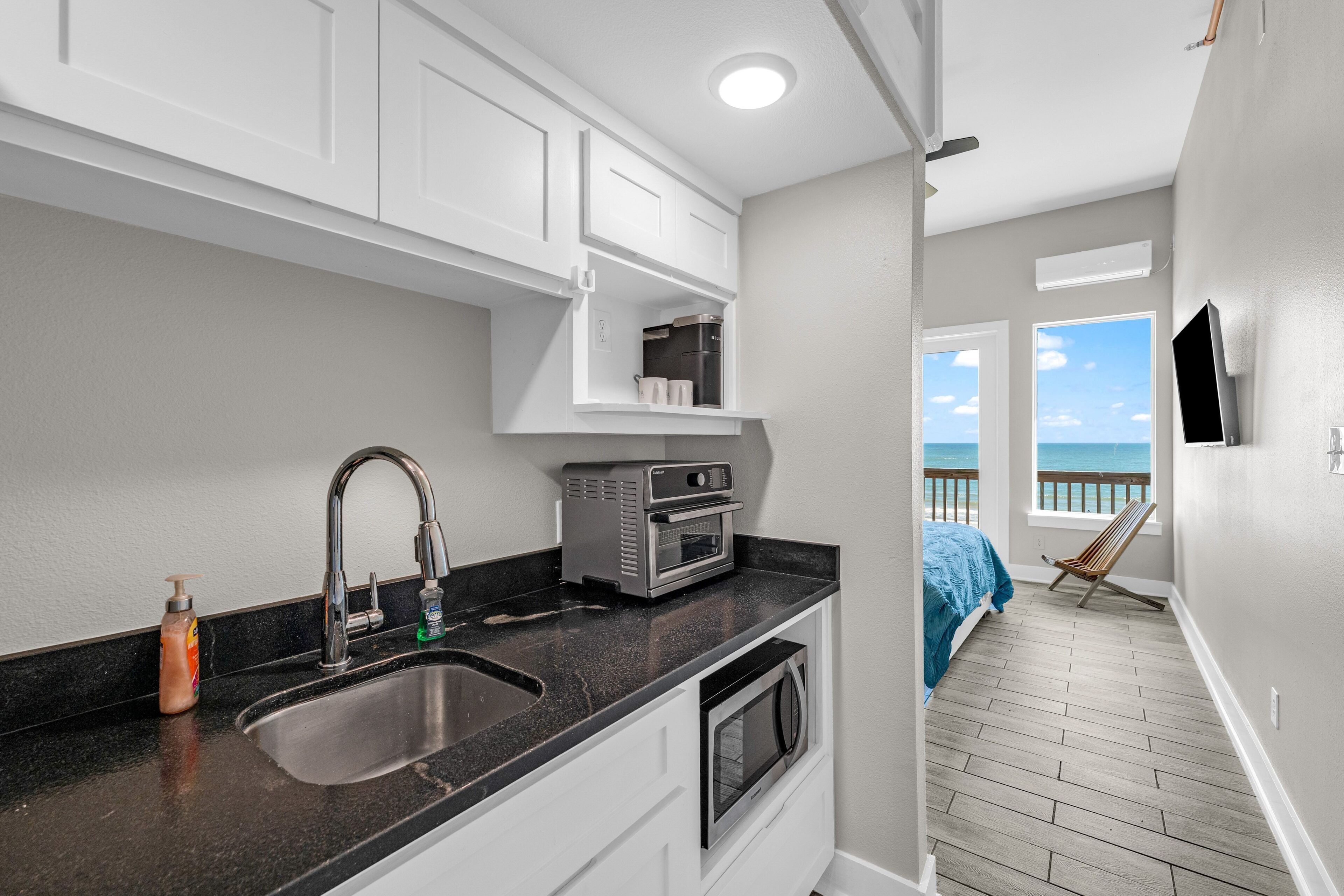 Fridge, microwave, coffee/tea maker, toaster