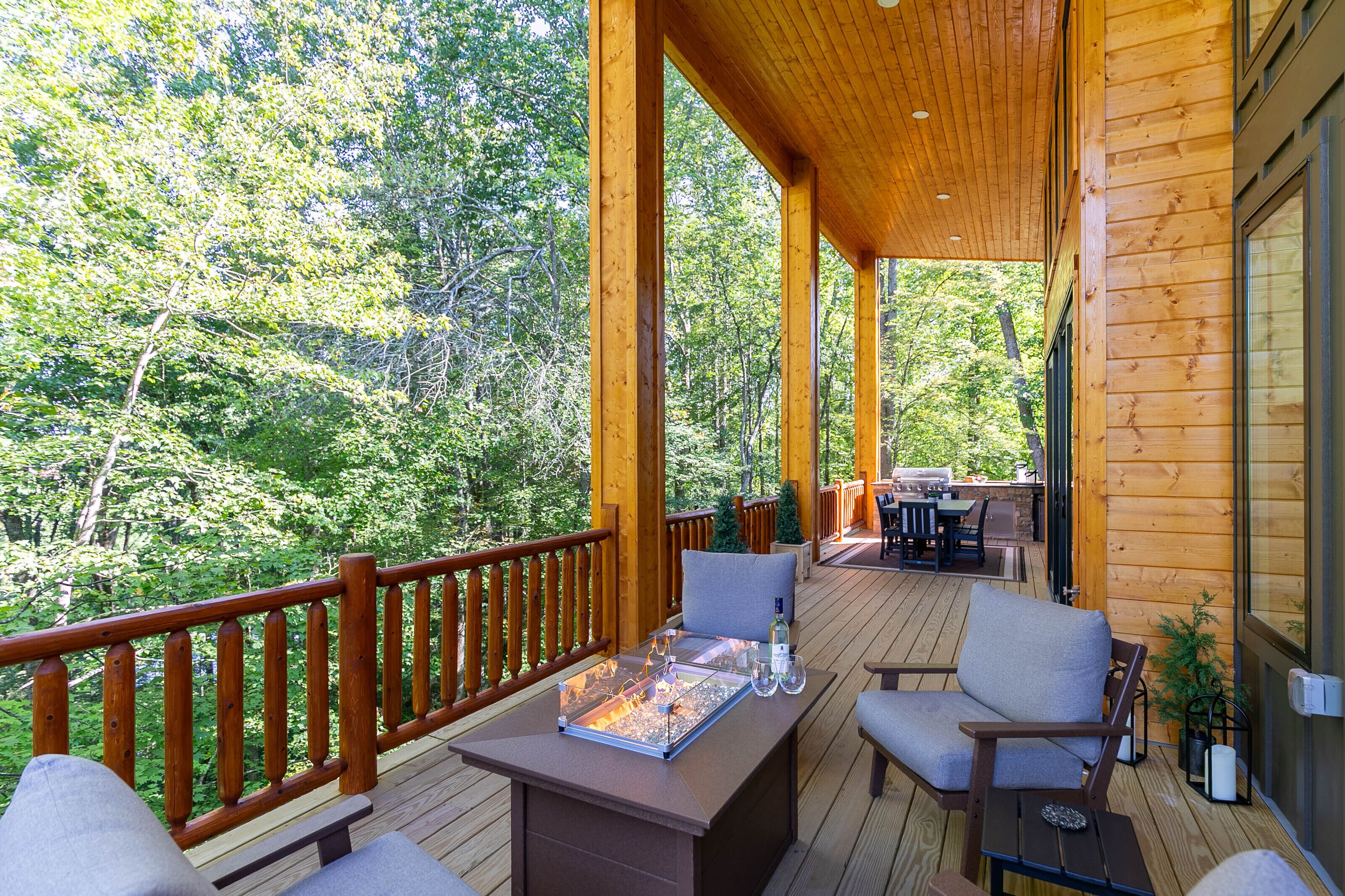 Gather around the fire table and let the trees do the rest. Rocky Creek Retreat's covered deck is made for slow mornings and easy evenings.