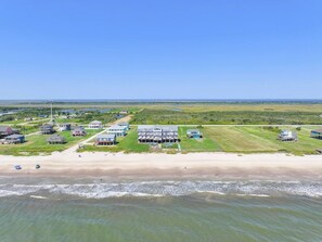 On the beach, sun-loungers