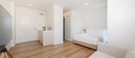 Apartment, Non Smoking, Balcony | In-room safe, iron/ironing board, free WiFi
