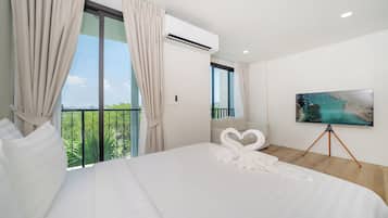 Apartment, Non Smoking, Balcony | In-room safe, iron/ironing board, free WiFi