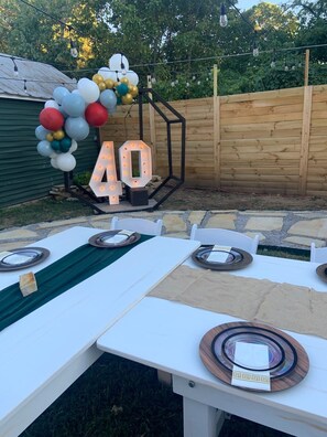 Outdoor dining - Old Clarksville House | Speakeasy Themed Home in Downtown with a SECRET BAR! (Clarksville)