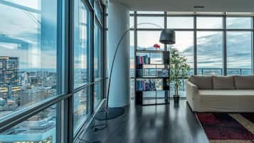 Superior Penthouse, Balcony, City View | Living area | 55-inch Smart TV with digital channels