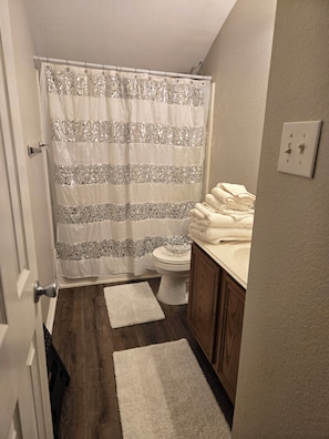 Hair dryer, towels, soap, toilet paper