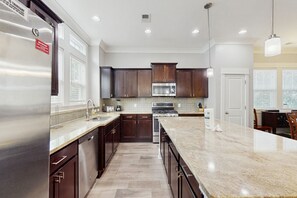 Fridge, microwave, oven, stovetop - Luxury beach house with elevator, walk to beach location, and garage parking (Myrtle Beach)