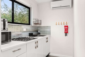 Microwave, stovetop, toaster, cookware/dishes/utensils