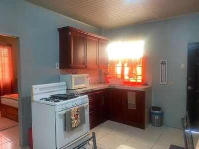 Cozy, family-friendly 2-bedroom apartment- Near Brian Lara & C3 mall