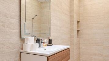 Shower, towels, toilet paper