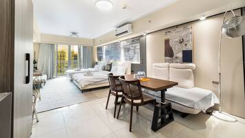 Deluxe Studio, Balcony, City View | Down duvets, individually decorated, individually furnished