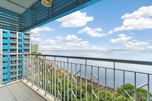 Family Condo | Balcony view - Luxury Penthouse & High-Floor Hotel near City of Dreams, Airport, Okada, and Solaire Casino (Parañaque)