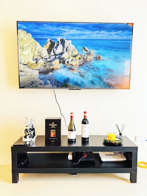 Luxury Penthouse, Balcony, City View | Living area | 44-inch Smart TV with digital channels