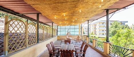 Family Room, Garden View | Terrace/patio