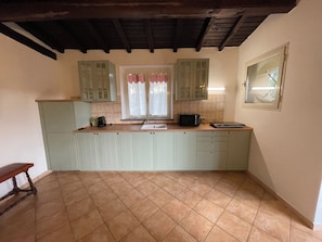 Apartament familiar, vistes al jardí | Cuina privada