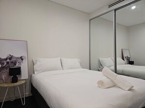 Fer et planche à repasser, draps fournis