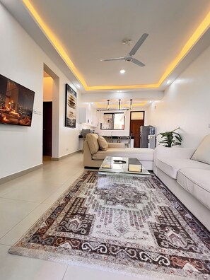 Living area - Cozy Baobab Waves Beachfront 1bed Apt with Netflix and high speed WiFi! (Mombasa)