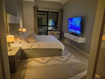 Cozy 1-bedroom apartment in lovely Gaborone with AC, fitness room
