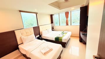 Deluxe Triple Room, City View | Iron/ironing board, free WiFi