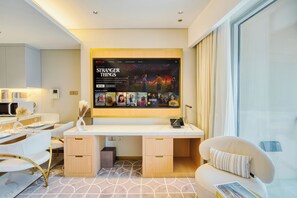 Luxury Studio, Balcony | Living area | Smart TV