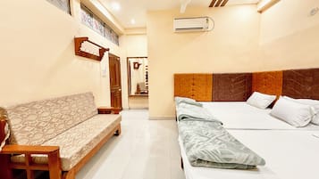 Premium bedding, desk, laptop workspace, free WiFi