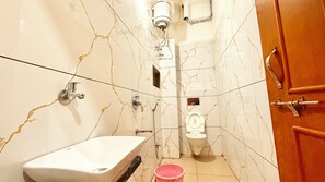 Deluxe Room | Bathroom | Shower, rainfall showerhead, soap, toilet paper - Hotel P Landmark Palace-near Main Places (Ujjain)
