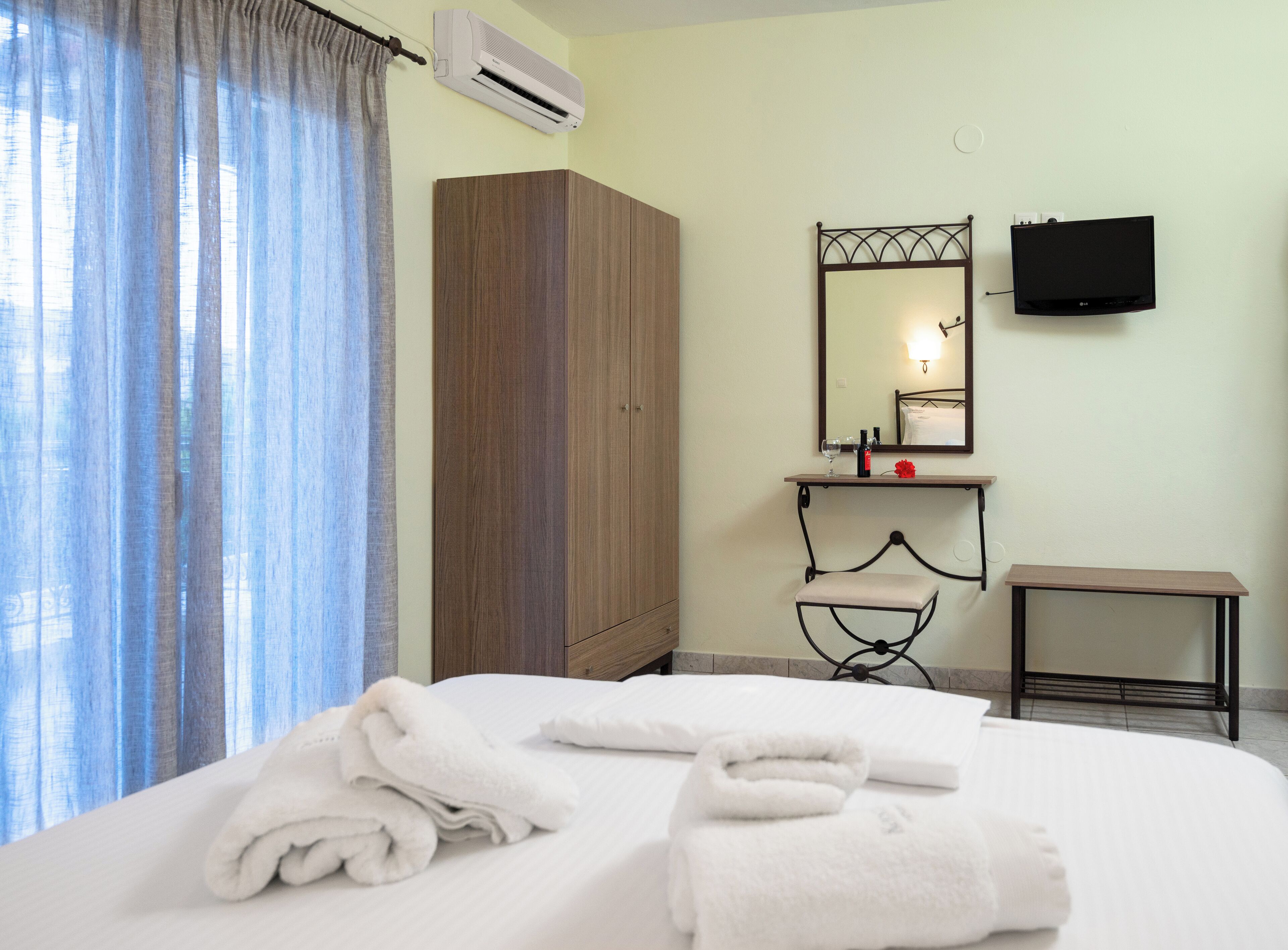 Deluxe Double Room, Balcony, Pool View | In-room safe, blackout curtains, iron/ironing board, free WiFi