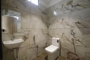 Deluxe Room, City View | Bathroom | Shower, towels, soap, toilet paper