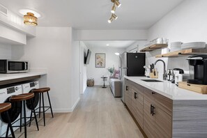 Fridge, microwave, stovetop, coffee/tea maker