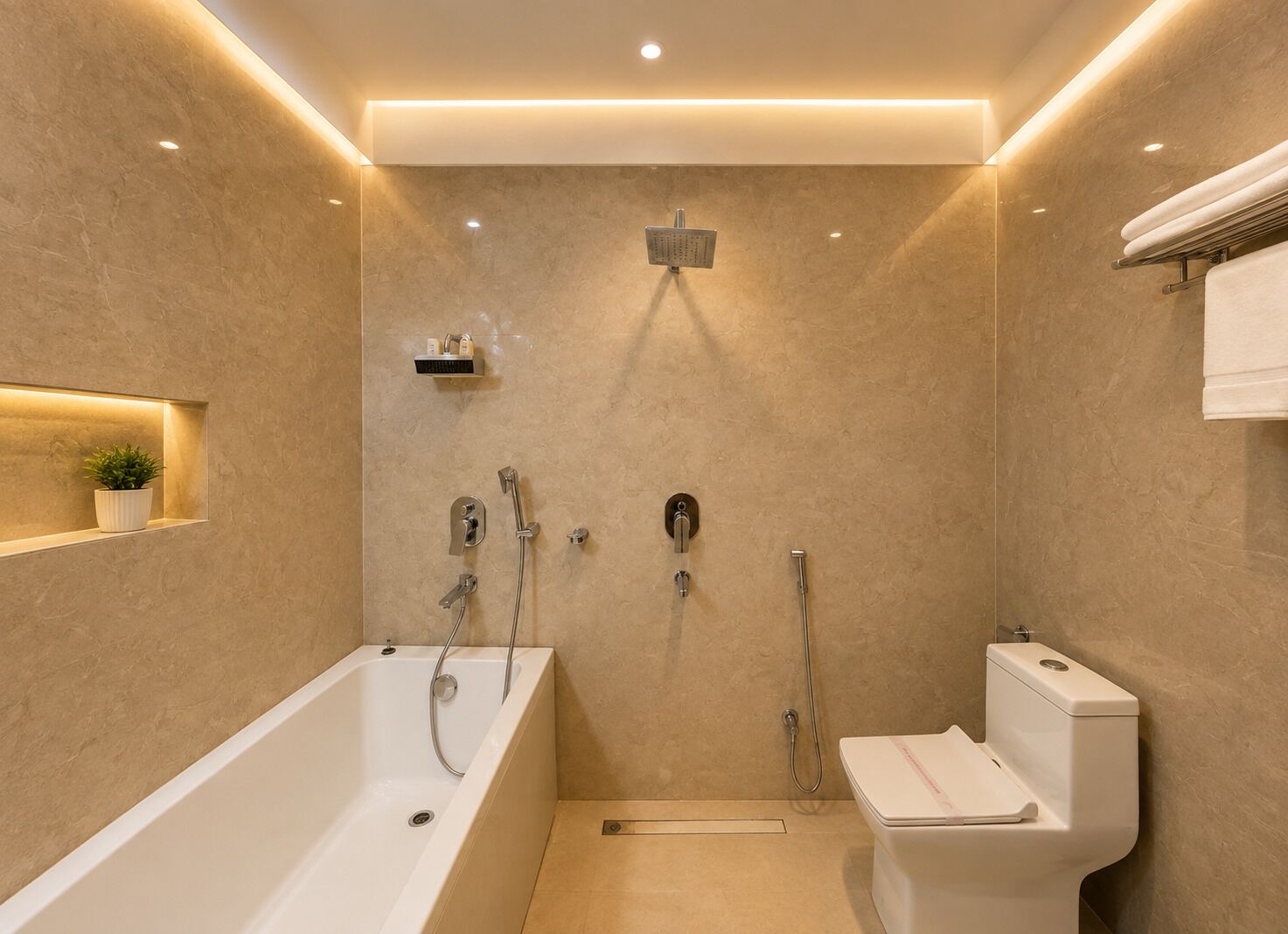 A modern bathroom with a bathtub, shower, and toilet.
