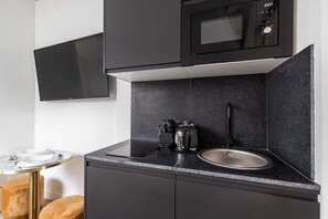 Apartment | Private kitchen | Fridge, microwave, stovetop, coffee/tea maker