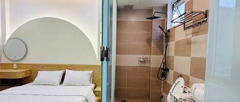 Bathroom | Shower, rainfall showerhead, hair dryer, slippers
