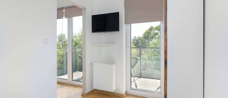 1 dormitorio, tabla de planchar con plancha, cuna de viaje y wifi