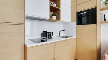 Appartement | Cuisine privée | Réfrigérateur, micro-ondes, four, plaque de cuisson