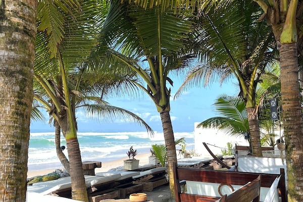Private beach, sun loungers, beach towels, beach massages