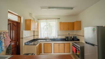 Vila luxo, vista para o jardim | Cozinha privada