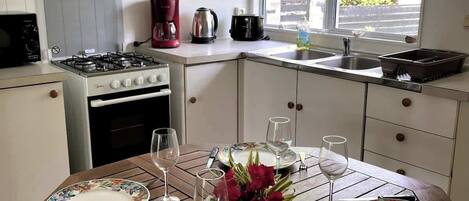 Fridge, microwave, oven, cookware/dishes/utensils