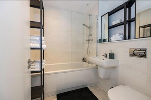 Hair dryer, towels, soap, shampoo