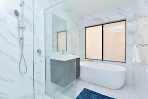 Shower, hair dryer, towels