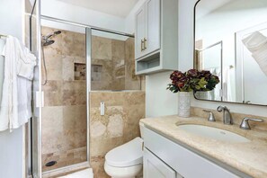 Shower, hair dryer, towels