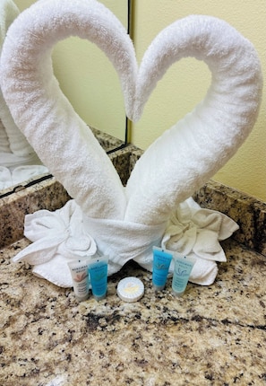 Hair dryer, towels, soap, toilet paper