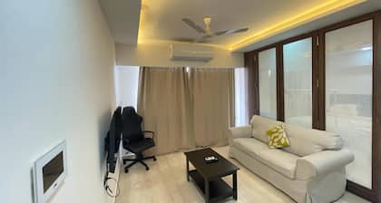 Business-Ready Apt near Jio World Centre | 1BR + Gym + Pool