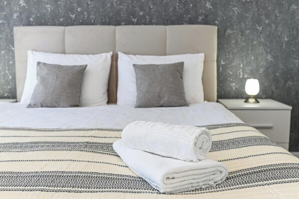 Family Apartment, Balcony, City View | In-room safe, desk, laptop workspace, blackout drapes