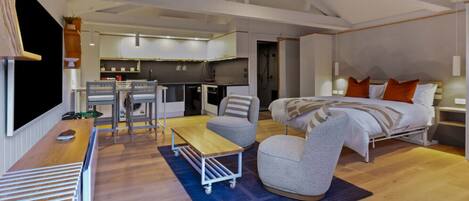 1 habitación, escritorio, tabla de planchar con plancha y cuna de viaje