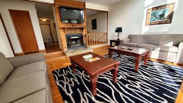 Signature House, 3 Bedrooms, Non Smoking, Kitchen | Living room | 35-inch Smart TV with cable channels