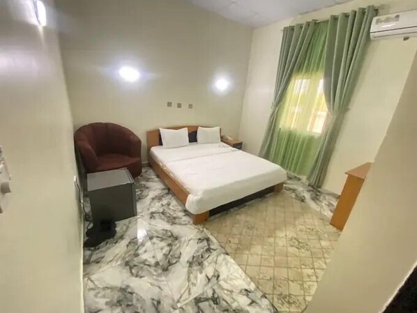 Family Apartment, Balcony, City View | In-room safe, desk, laptop workspace, blackout drapes