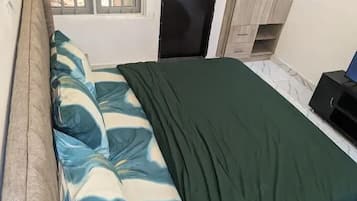 Family Apartment, Balcony, City View | In-room safe, desk, laptop workspace, blackout drapes