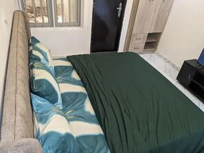 Family Apartment, Balcony, City View | In-room safe, desk, laptop workspace, blackout drapes