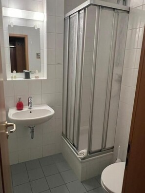 Shower, towels, soap, shampoo